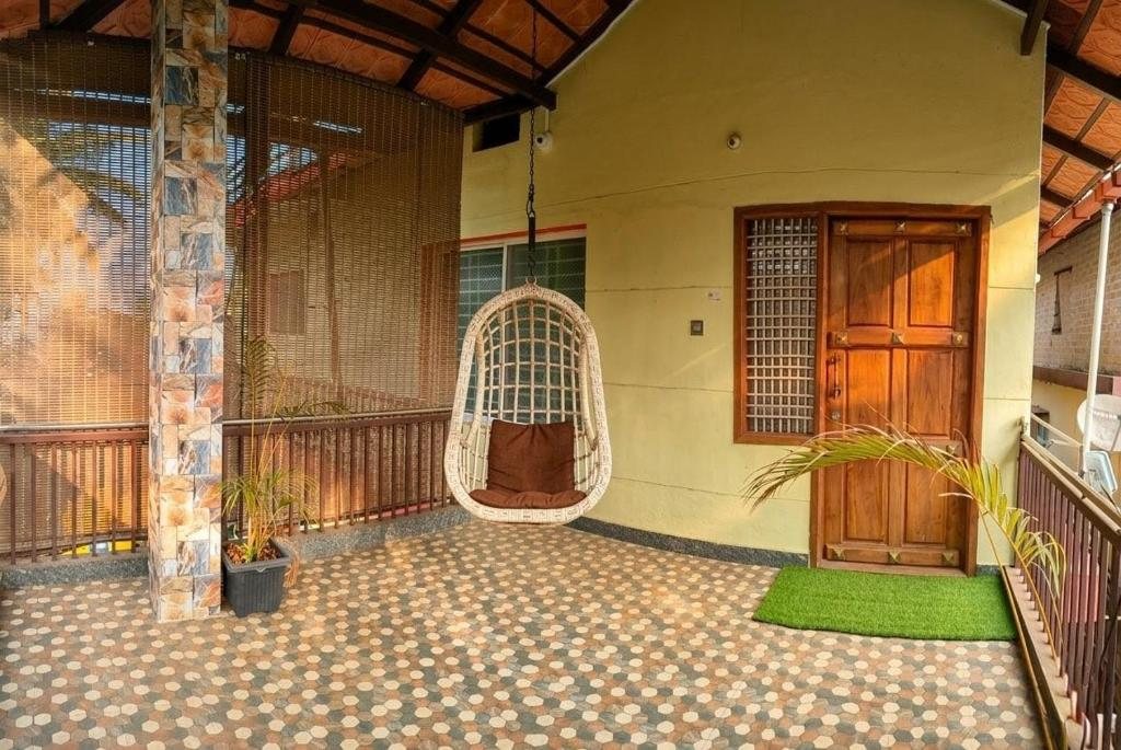 Balcony with swing seat in the 2BHK house